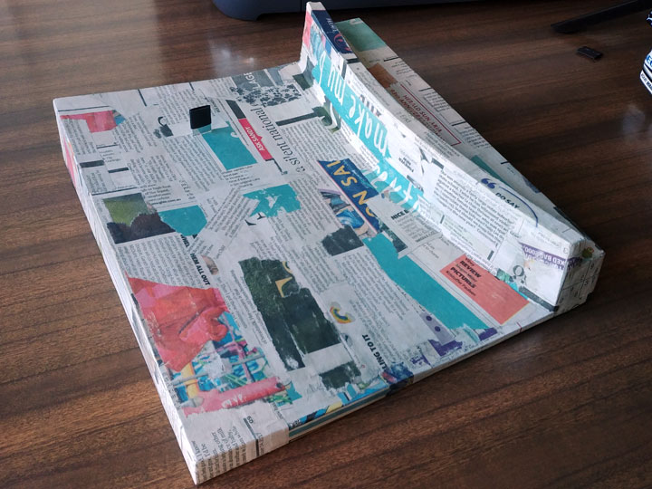 Covering the V8 diorama with paper mache