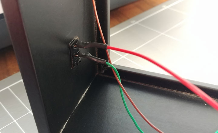 The switch is wired to the LED light panel and the battery pack